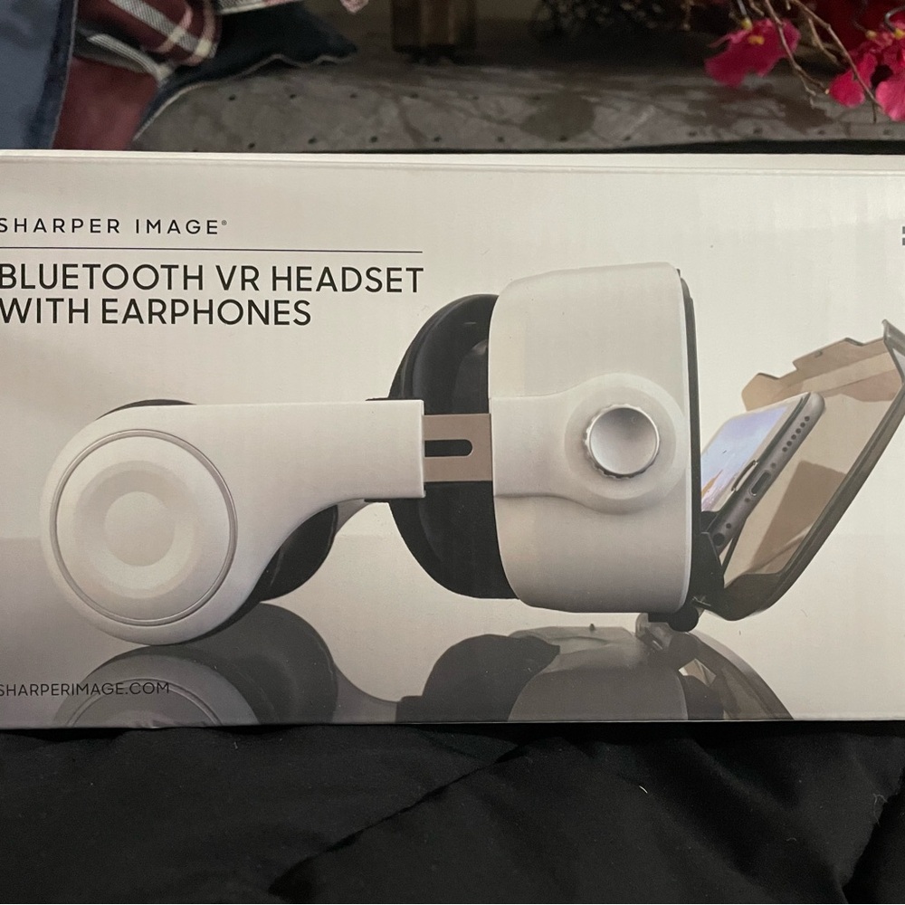 Sharper image BRAND NEW ,Bluetooth headset.